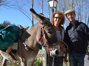 couple with donkey on donkey trekking holiday